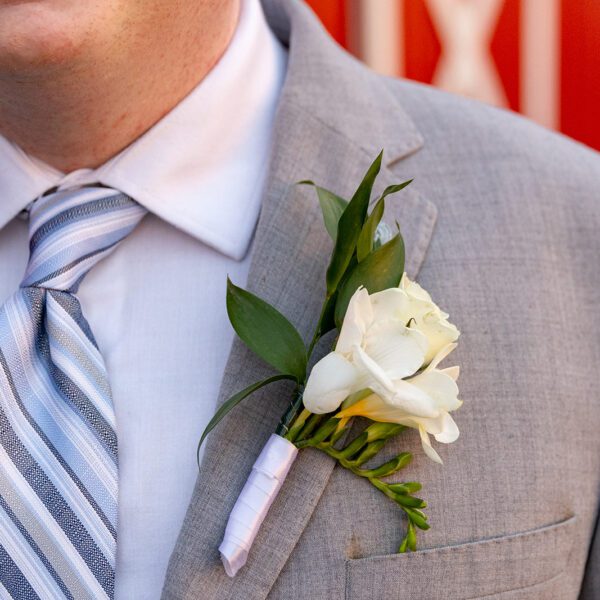 White and green wedding boutonniere