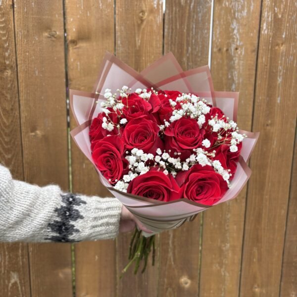 dozen red roses and babys breath bouquet