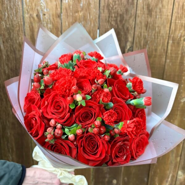 red rose and carnation christmas holiday bouquet