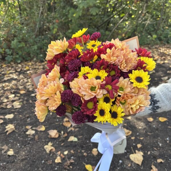 Autumn bouquet with red orange and yellow chysanthemums
