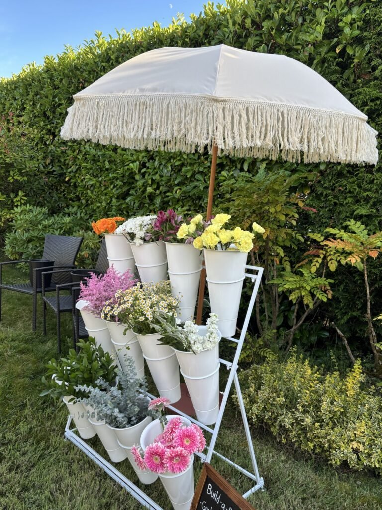 Interactive flower bar Surrey arrangement station with seasonal blooms