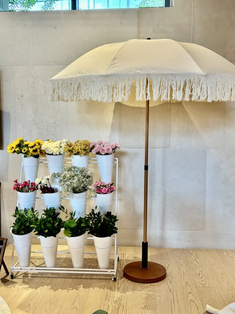 Flower bar setup with assorted fresh blooms by a florist in Surrey