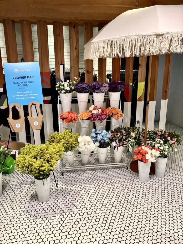 Flower bar Surrey setup with fresh flowers displayed on a white cart by Petal & Bulb