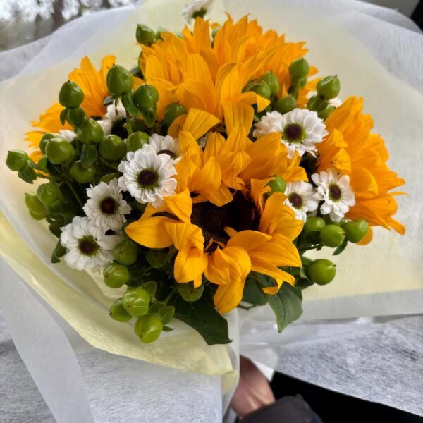 sunflowers and hypericum berries bouquet